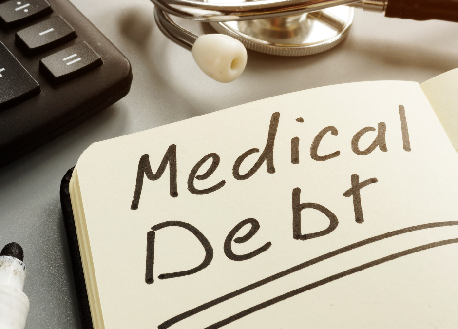 decorative - picture of the words "Medical Debt" written on a notebook page.